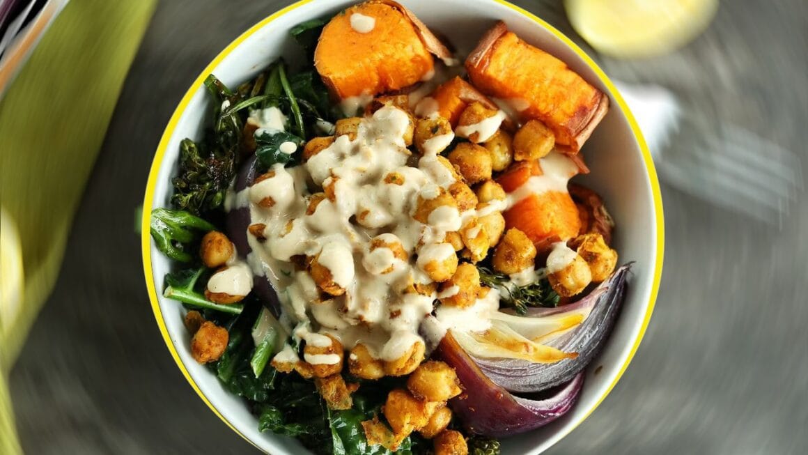 Buddha Bowl with Brown Rice, Roasted Vegetables, and Tahini Sesame Sauce